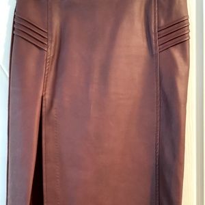 XOXO small cranberry/maroon color pleather skirt with high side slit